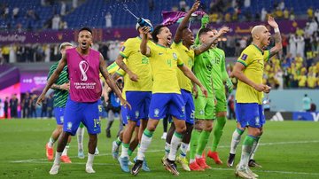 Jogadores brasileiros comemorando a vitória contra a Coreia do Sul (Foto: Getty Images)